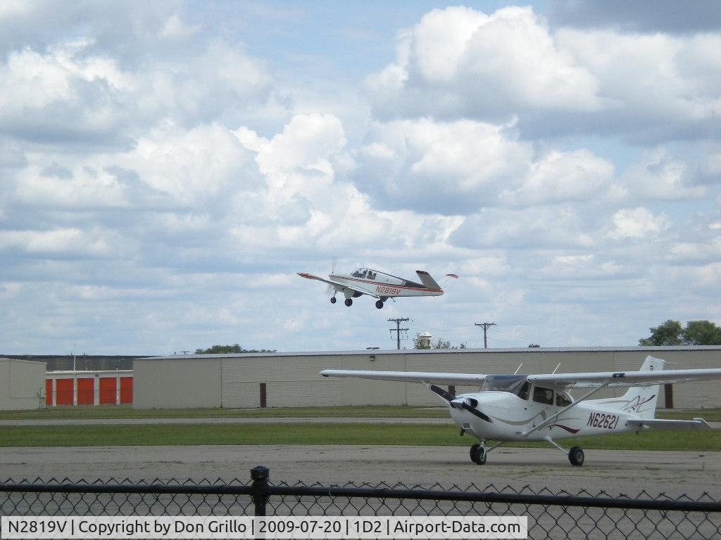 N2819V, 1947 Beech 35 Bonanza C/N D-221, N2819V Takeoff from 	Canton-Plymouth-Mettetal Airport