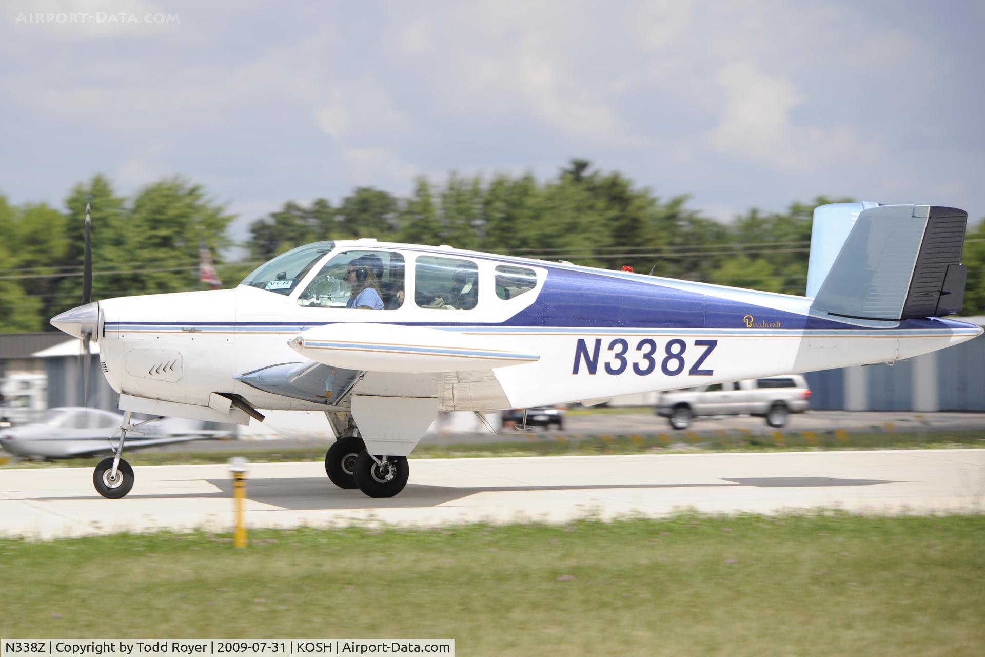N338Z, 1960 Beech M35 Bonanza C/N D-6506, Departing OSH on 27
