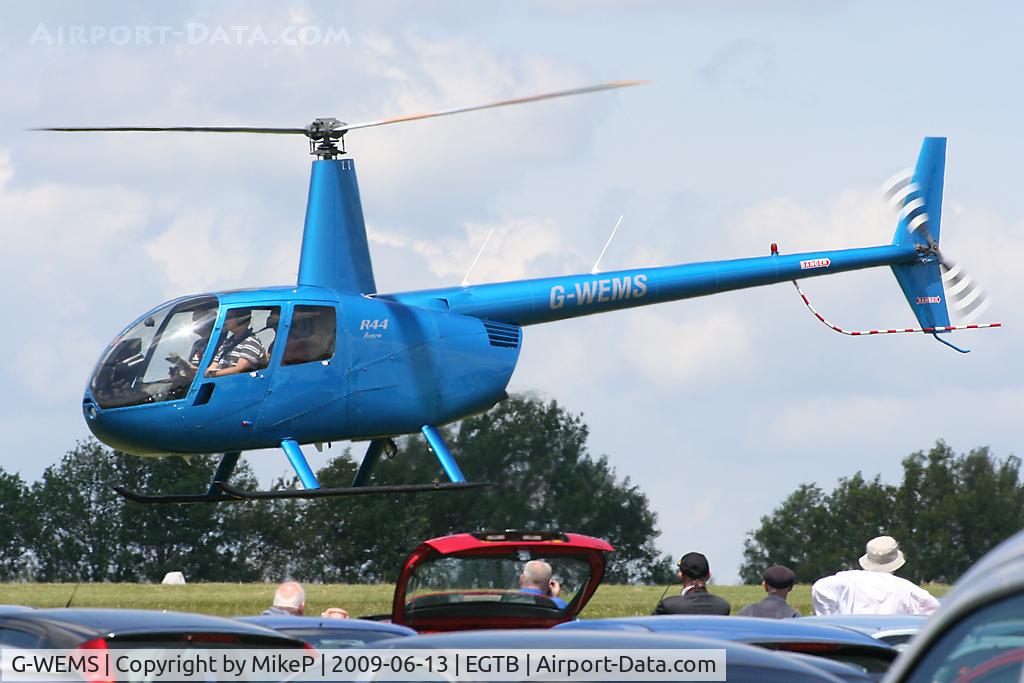 G-WEMS, 2000 Robinson R44 Astro C/N 0730, Heading for departure after visiting Aero Expo 2009.