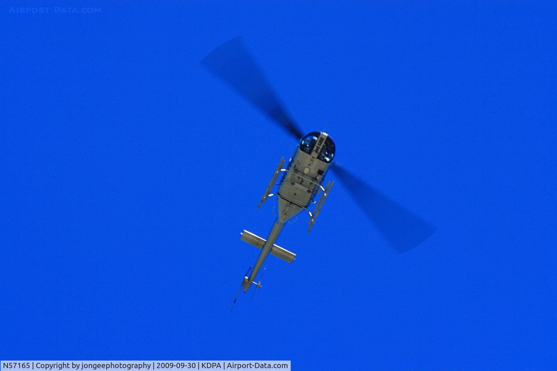 N57165, Bell 206B C/N 3816, Circling at KDPA