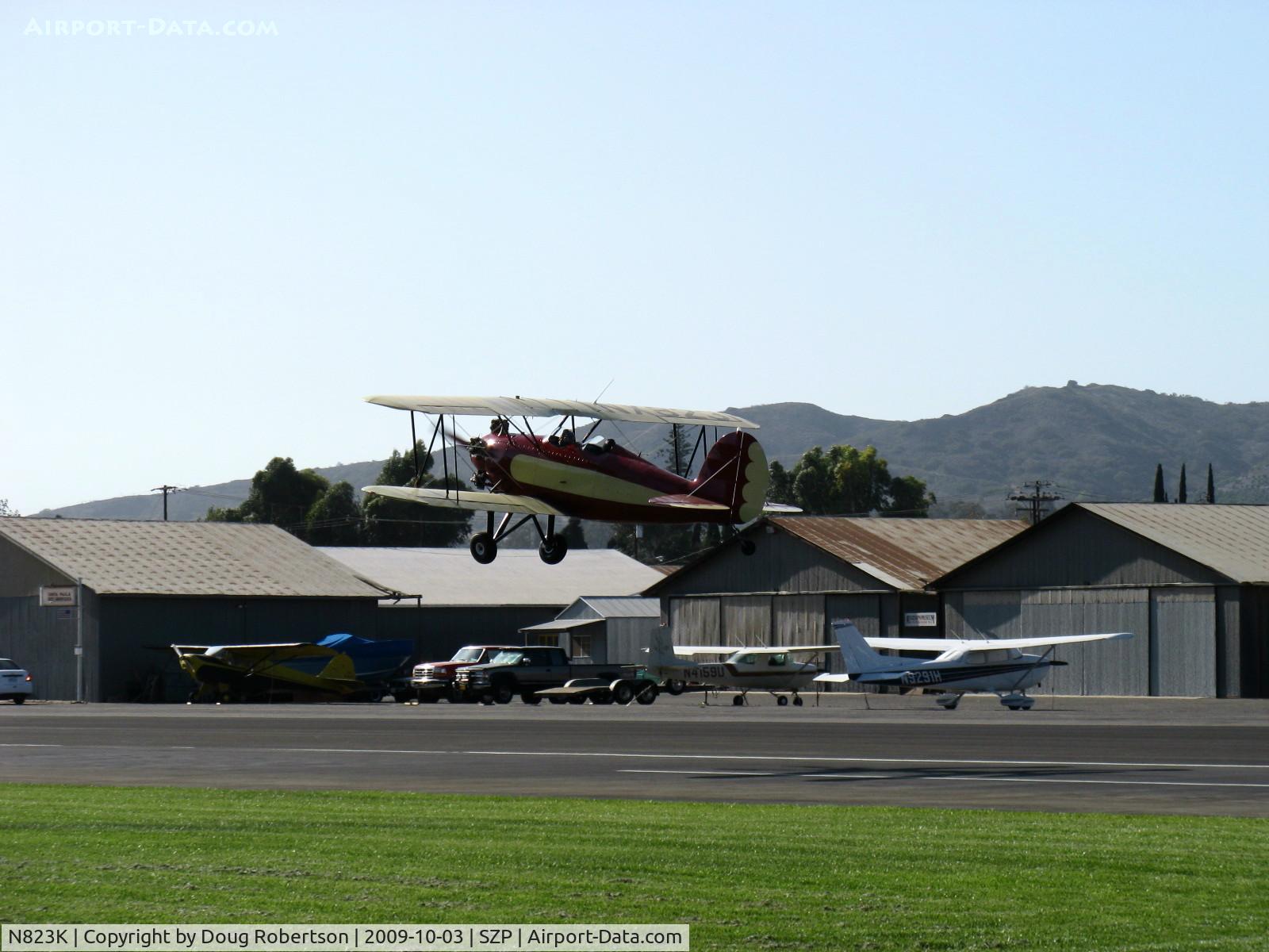 N823K, 1993 Great Lakes 2T-1A Sport Trainer C/N 1020, 1993 Ball GREAT LAKES 2T-1AK as NX823K, Kinner R 56, 160 Hp modified for fuel injection, takeoff climb Rwy 22