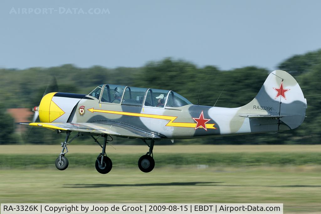 RA-3326K, 1987 Bacau Yak-52 C/N 877401, landing at Schaffen-Diest for the old timer fly in.