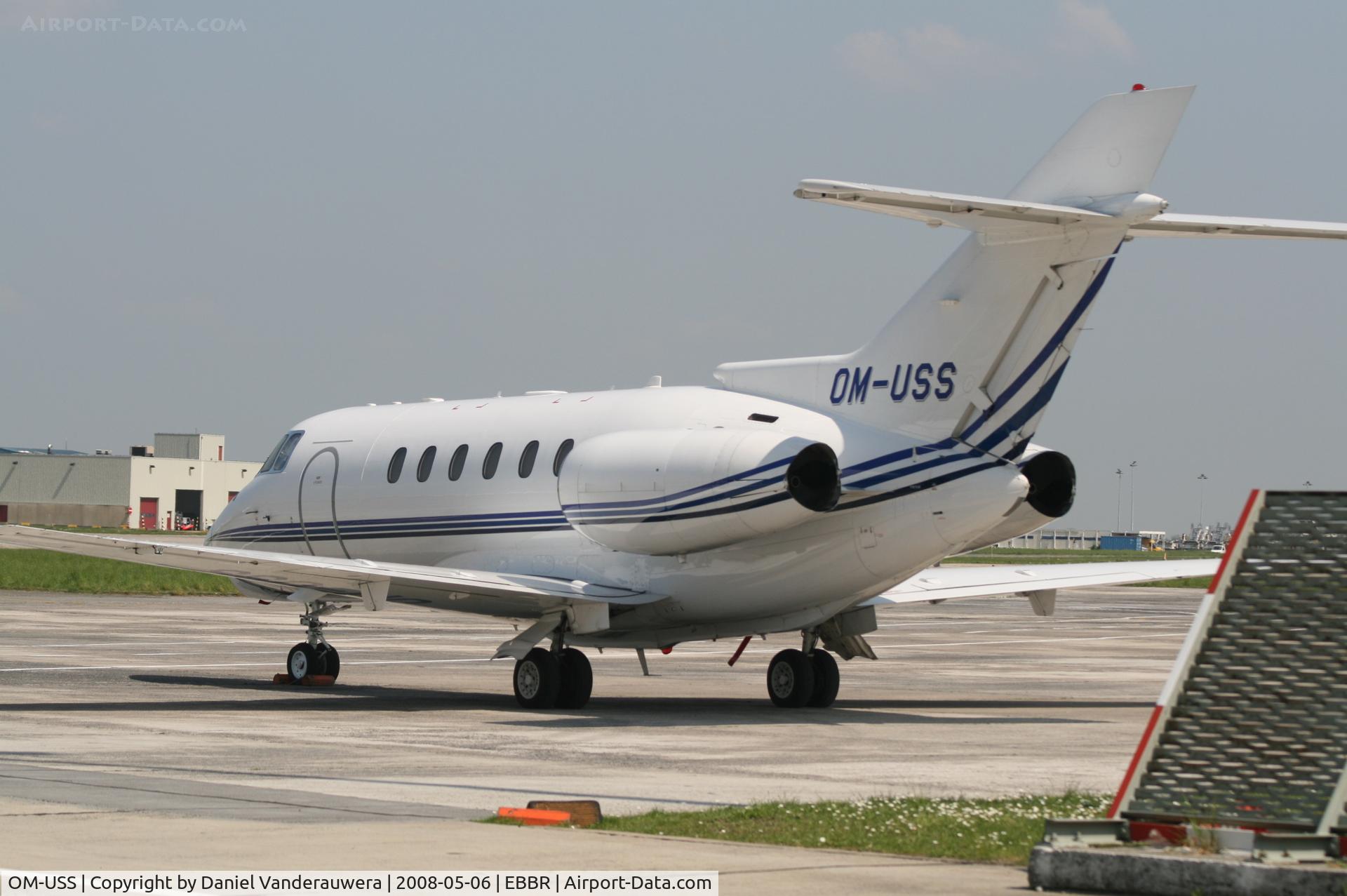 OM-USS, 2005 Raytheon Hawker 800XP C/N 258720, parked on General Aviation apron