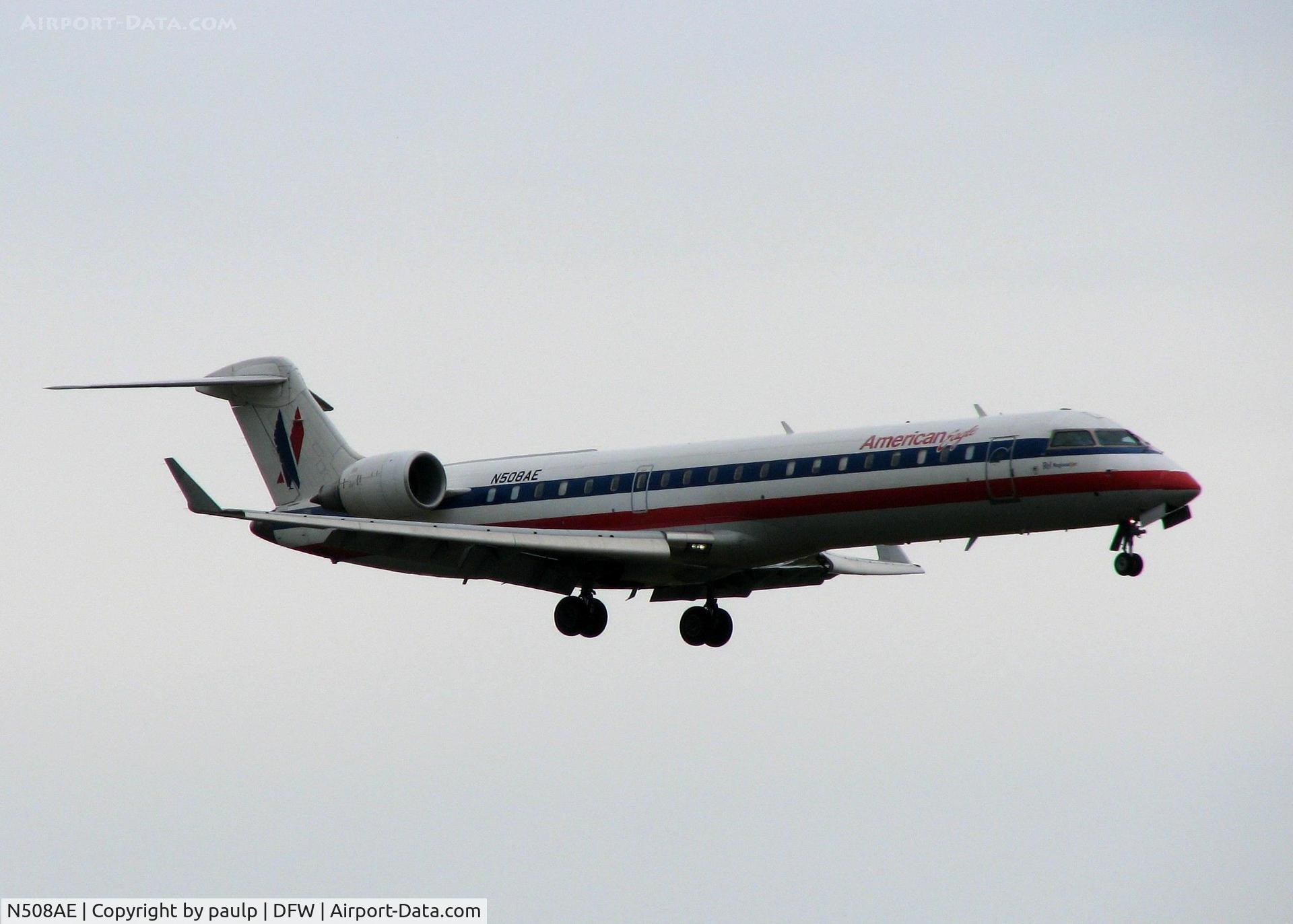 N508AE, 2002 Bombardier CRJ-701ER (CL-600-2C10) Regional Jet C/N 10072, Landing on 18R at DFW. A rainy day!