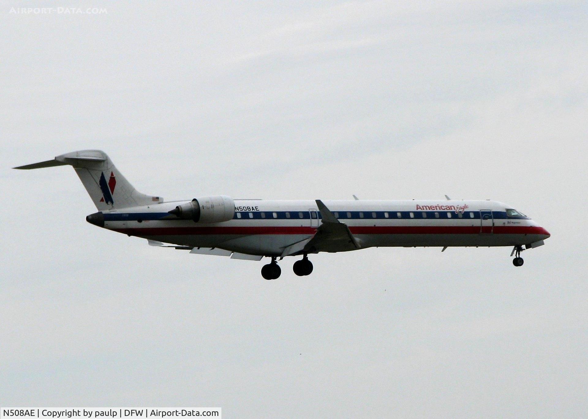 N508AE, 2002 Bombardier CRJ-701ER (CL-600-2C10) Regional Jet C/N 10072, Landing on 18R. A nasty, rainy day!