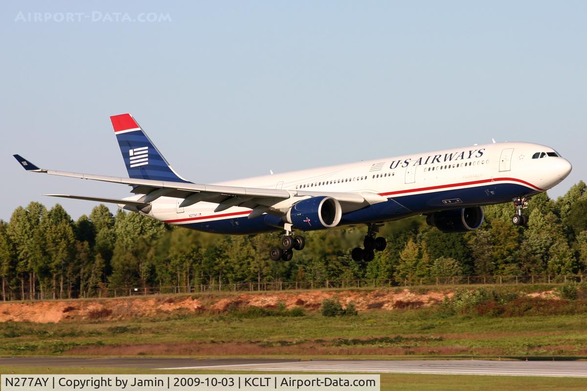 N277AY, 2001 Airbus A330-323 C/N 0380, Lit by the setting sun after a long flight from England.