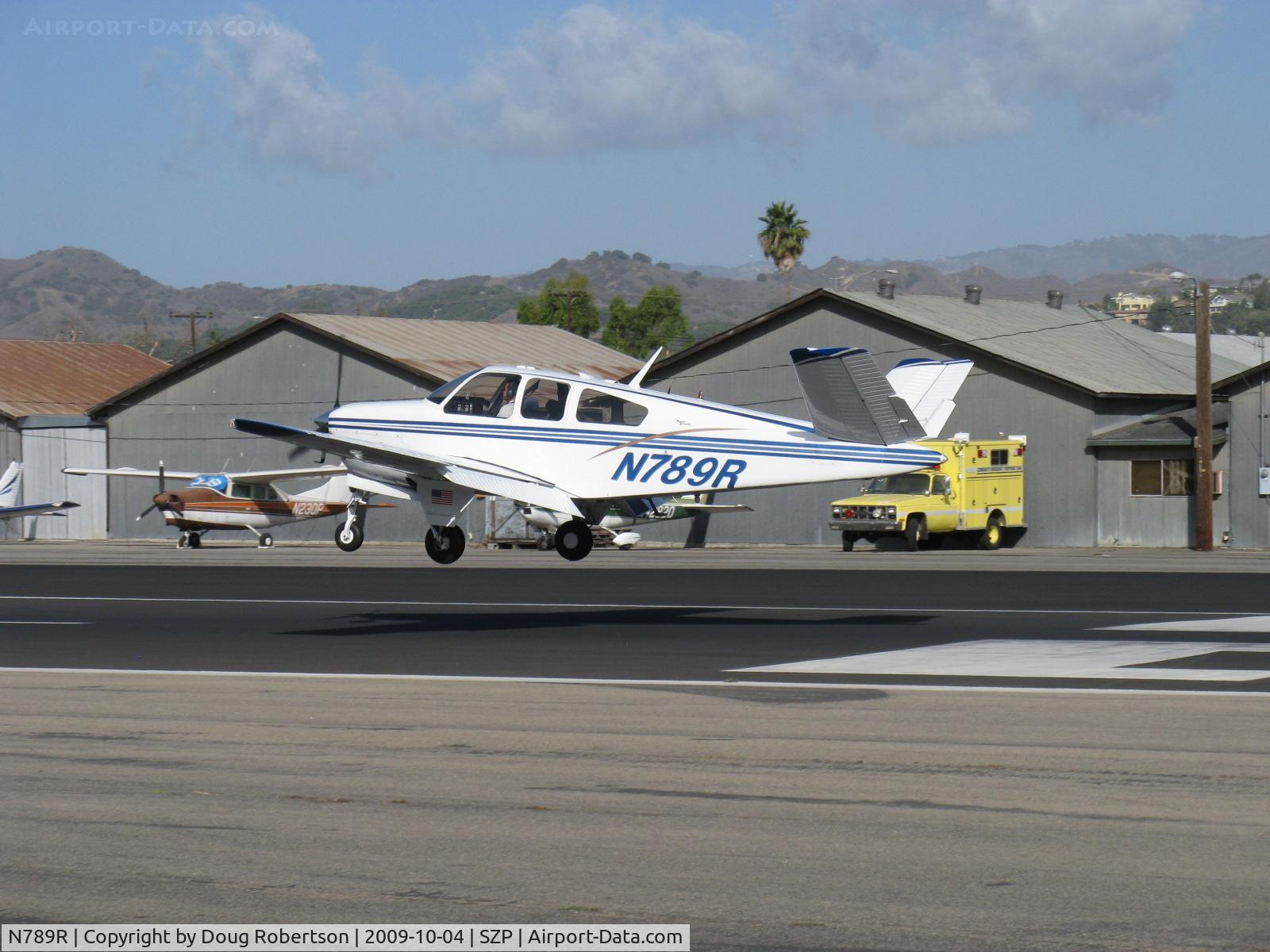 N789R, 1965 Beech S35 Bonanza C/N D-7777, 1965 Beech S35 BONANZA, Continental IO-520-B 285 Hp, near touchdown Rwy 22