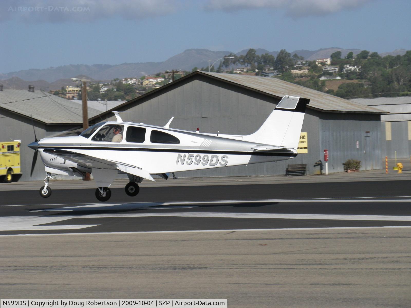 N599DS, 1967 Beech E33A Bonanza C/N CE-182, 1967 Beech E33A BONANZA, Continental IO-520-B 285 Hp, near touchdown Rwy 22