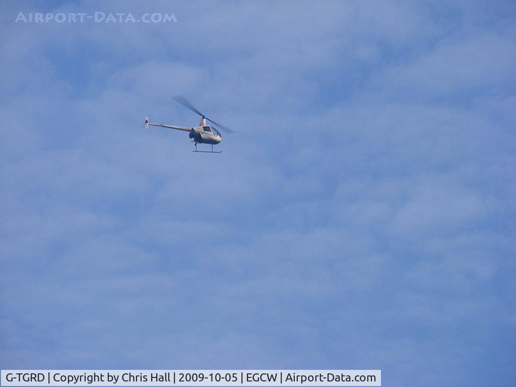 G-TGRD, 1997 Robinson R22 Beta II C/N 2712, 500 ft above us as we flew into Welshpool, we were at 2000ft