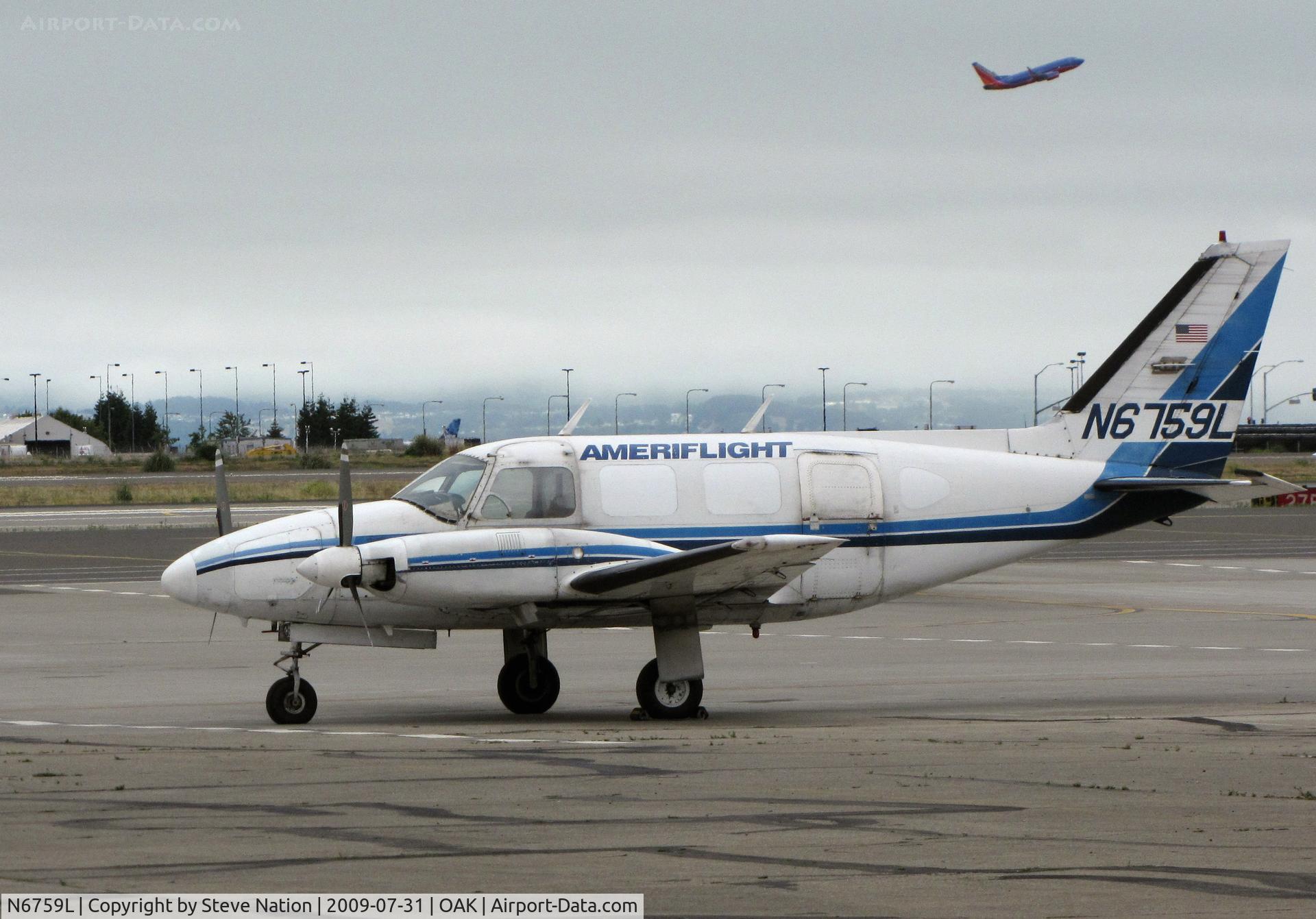 N6759L, 1970 Piper PA-31-310 Navajo C/N 31-661, Ameriflight 1970 Piper PA-31-310 freighter in non-standard colors@ RHV