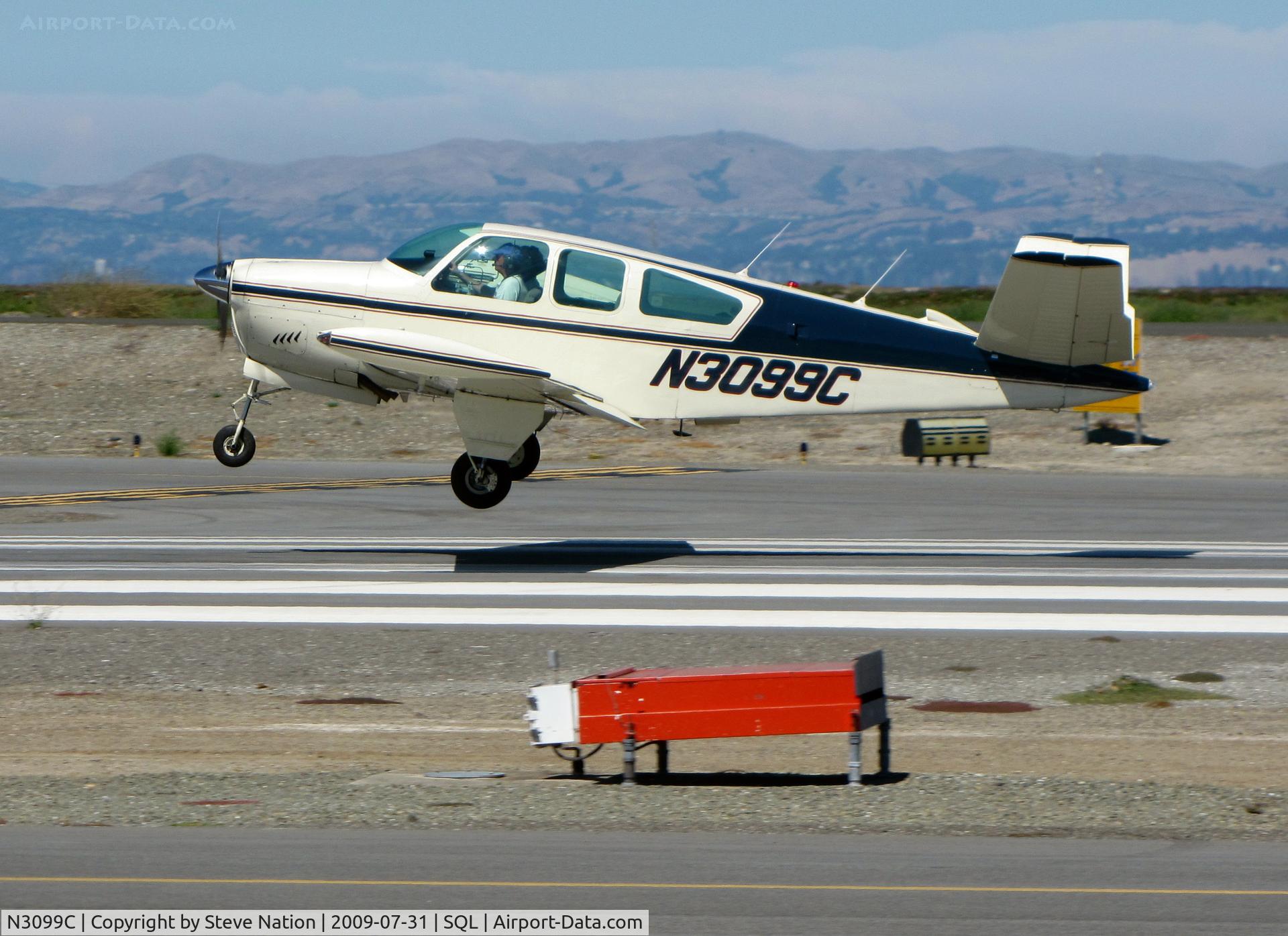 N3099C, 1958 Beech K35 Bonanza C/N D-5782, Immaculate 1958 Beech K35 about to touchdown (Love the Bonanza!)