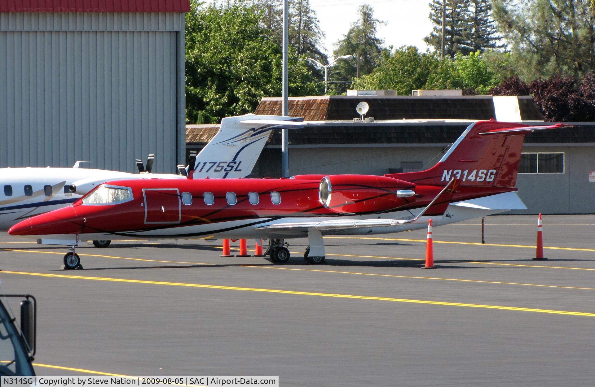 N314SG, 1997 Learjet Inc 31A C/N 133, Bright red 1997 Learjet Inc 31A visiting from John Wayne (Orange County) Airport in southern California