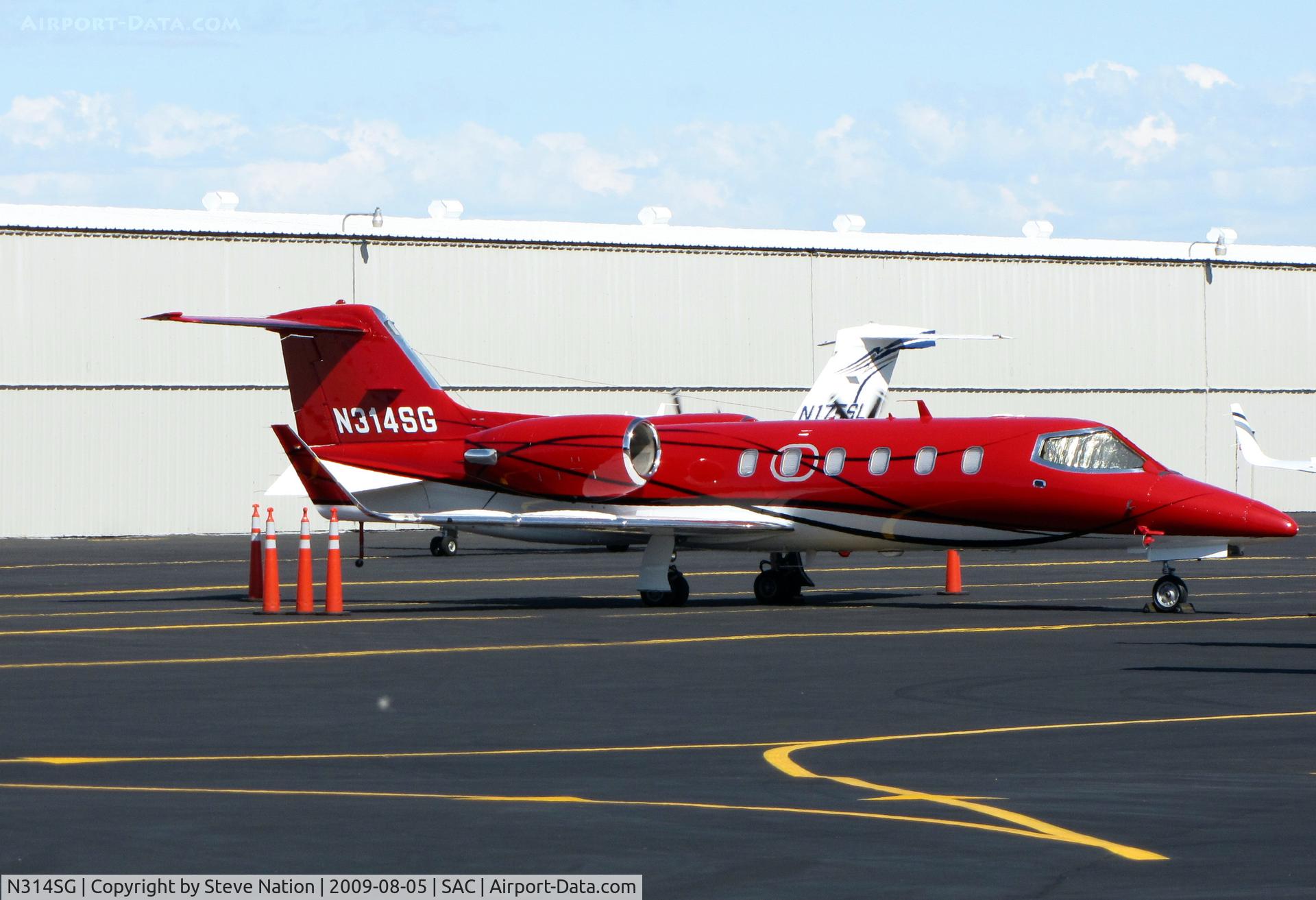 N314SG, 1997 Learjet Inc 31A C/N 133, Bright red 1997 Learjet Inc 31A visiting from John Wayne (Orange County) Airport in southern California