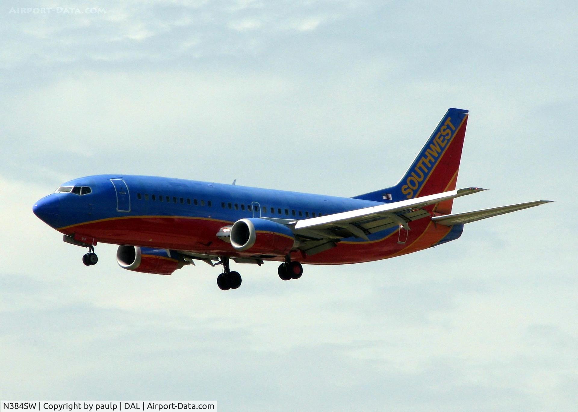 N384SW, 1994 Boeing 737-3H4 C/N 26590, Landing on runway 18R at Dallas Love Field.