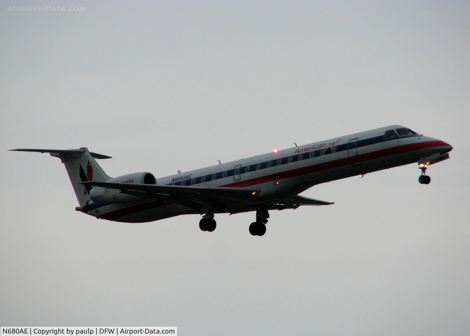 N680AE, 2004 Embraer ERJ-145LR (EMB-145LR) C/N 14500820, Landing on 18R at DFW. Rainy day in Dallas!