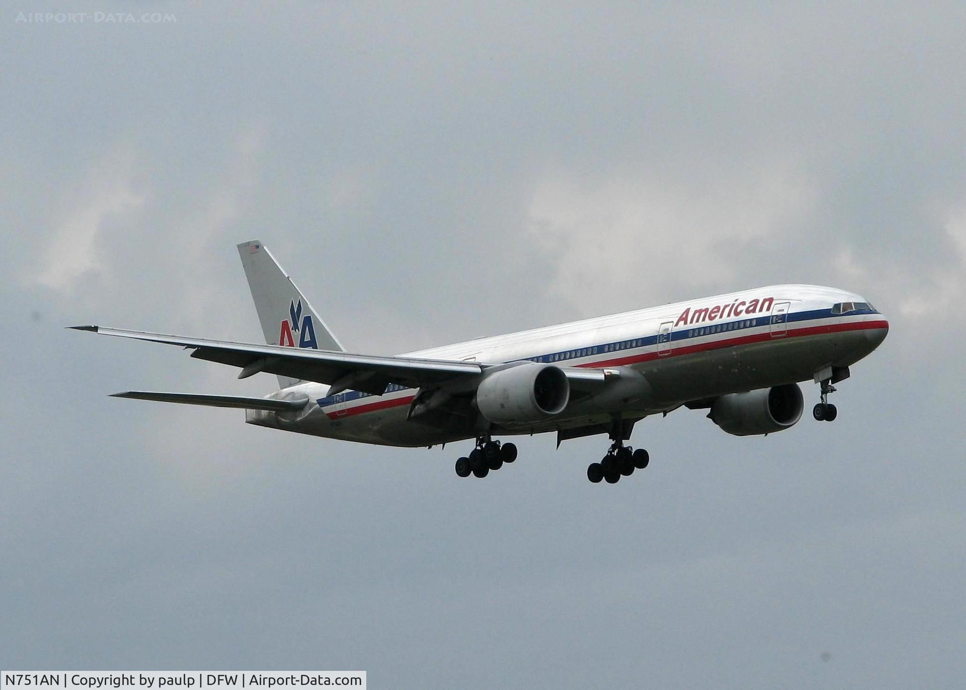 N751AN, 2001 Boeing 777-223 C/N 30798, American 777 landing on 18R at DFW after a long flight from Tokyo Narita. A rainy day a Dallas!