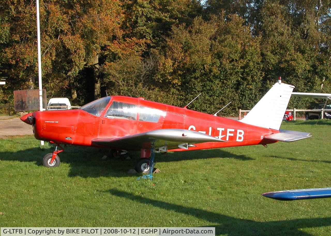 G-LTFB, 1967 Piper PA-28-140 Cherokee C/N 28-23343, SITTING OUTSIDE THE WILTSHIRE AVIATION HANGER. END OF SEASON FLY-IN