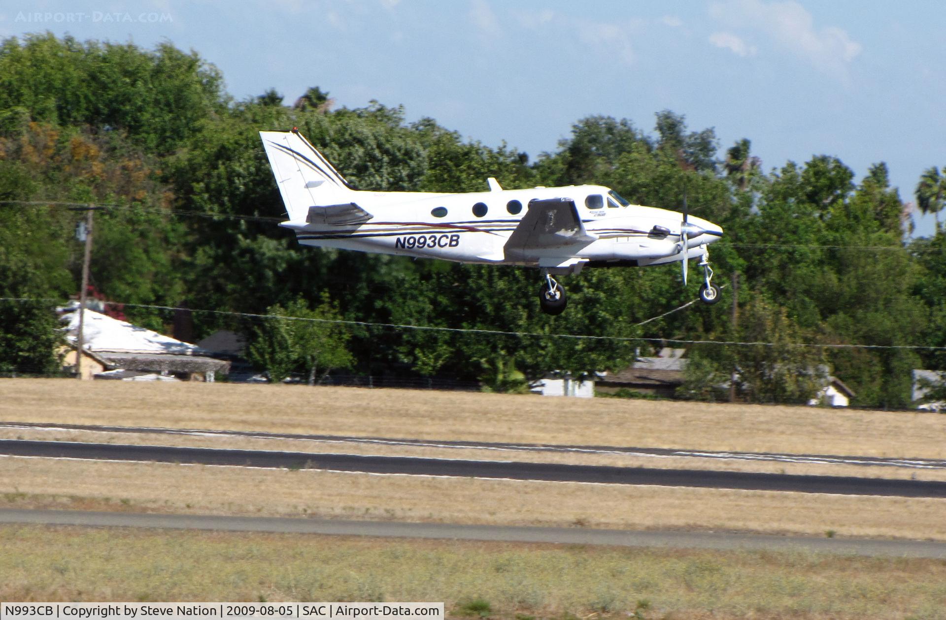 N993CB, 1999 Raytheon Aircraft Company C90A C/N LJ-1550, 1999 Raytheon C90A King Air taking-off for flight to Chico, CA on HOT summer day