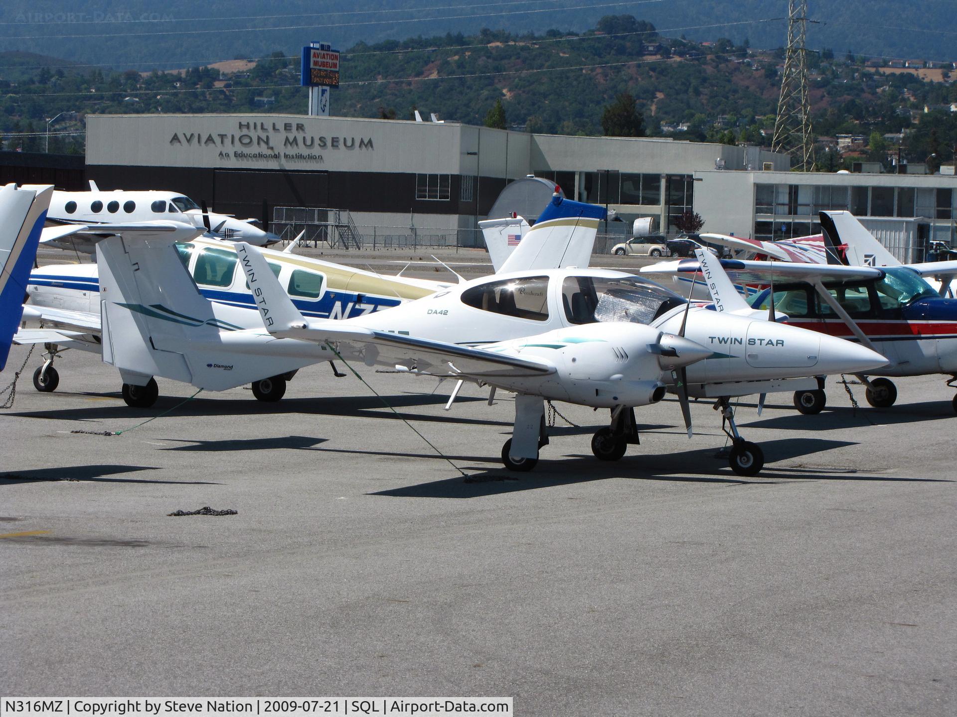 N316MZ, 2007 Diamond DA-42 Twin Star C/N 42.AC054, 2007 Diamond Aircraft Ind Inc DA 42 from washington state on visitor's ramp