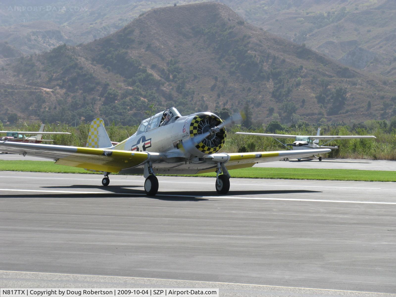 N817TX, 1942 North American AT-6D Texan C/N 88-18022 (42-86241), 1942 North American AT-6D 'Problem Child', P&W R-1340 Wasp 600 Hp, taxi off Rwy 22
