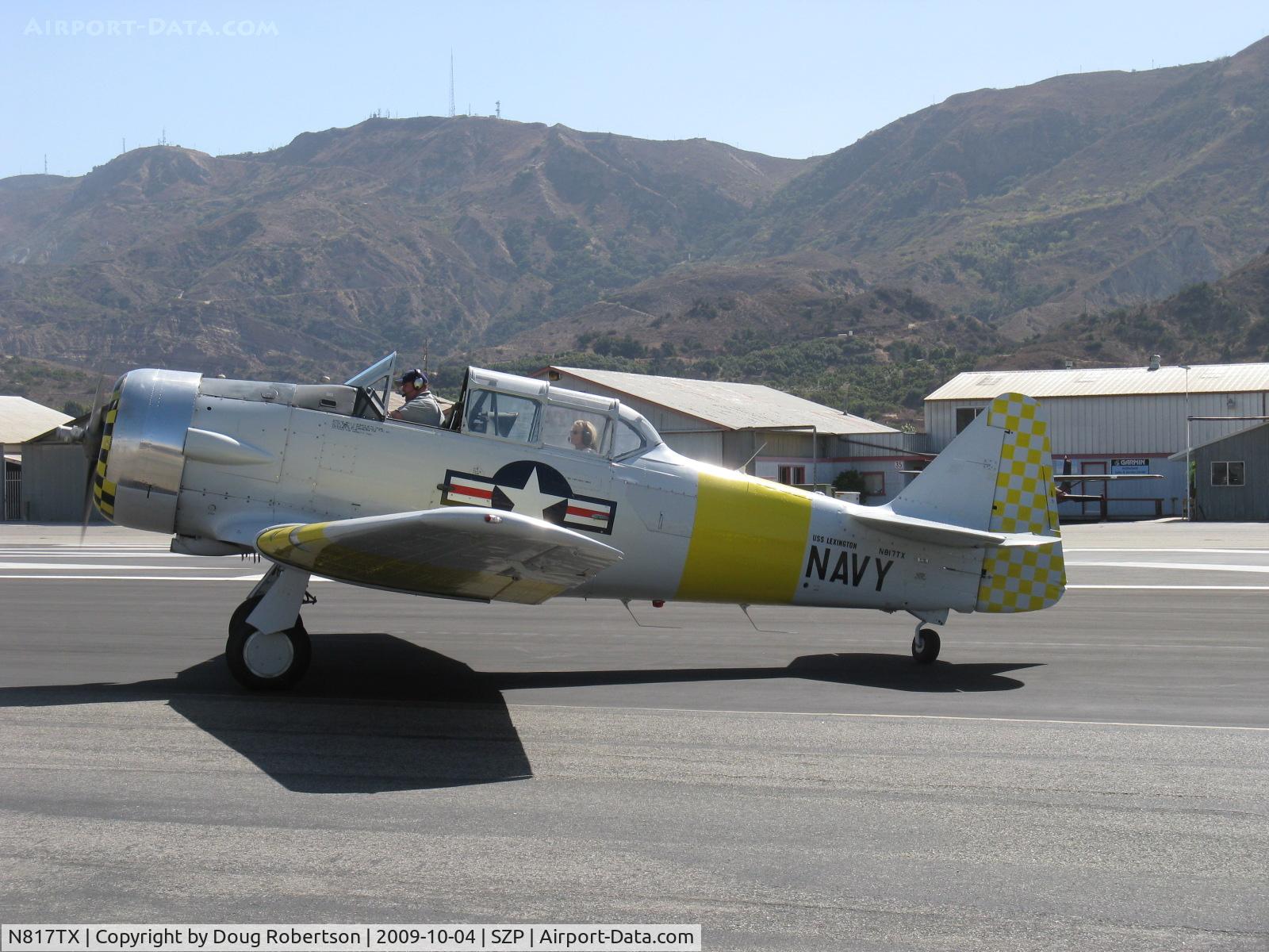 N817TX, 1942 North American AT-6D Texan C/N 88-18022 (42-86241), 1942 North American AT-6D 'Problem Child', P&W R-1340 Wasp 600 Hp, holding short Rwy 22