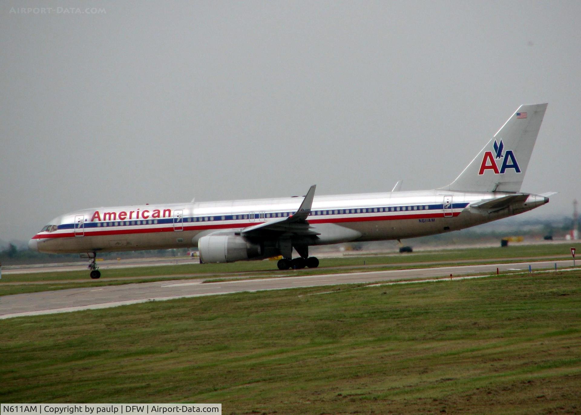 N611AM, 1989 Boeing 757-223 C/N 24487, Taxiing out of the American hanger about to take off on 18R.