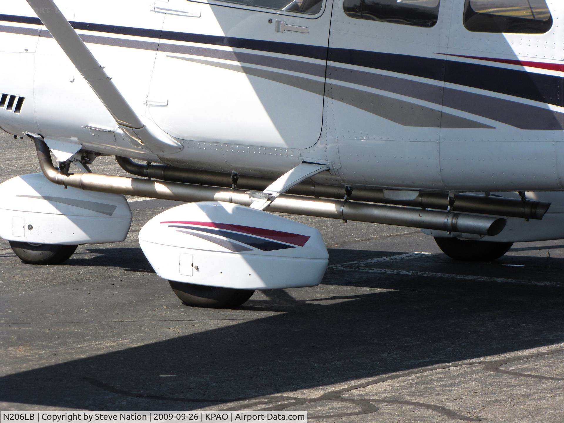 N206LB, 1999 Cessna 206H Stationair C/N 20608055, Cessna 206H (close-up extended exhaust pipe)