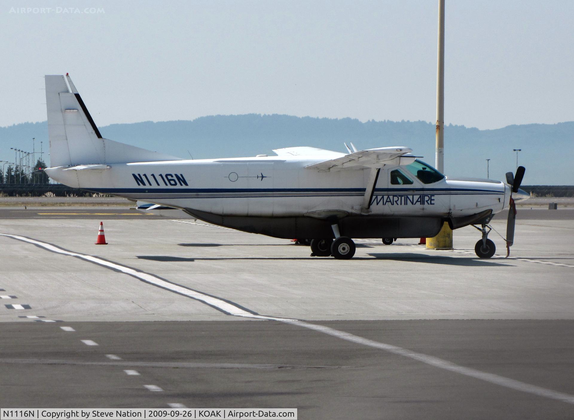 N1116N, 1994 Cessna 208B C/N 208B0417, Martinaire 1994 Cessna 208B freighter on North field ramp