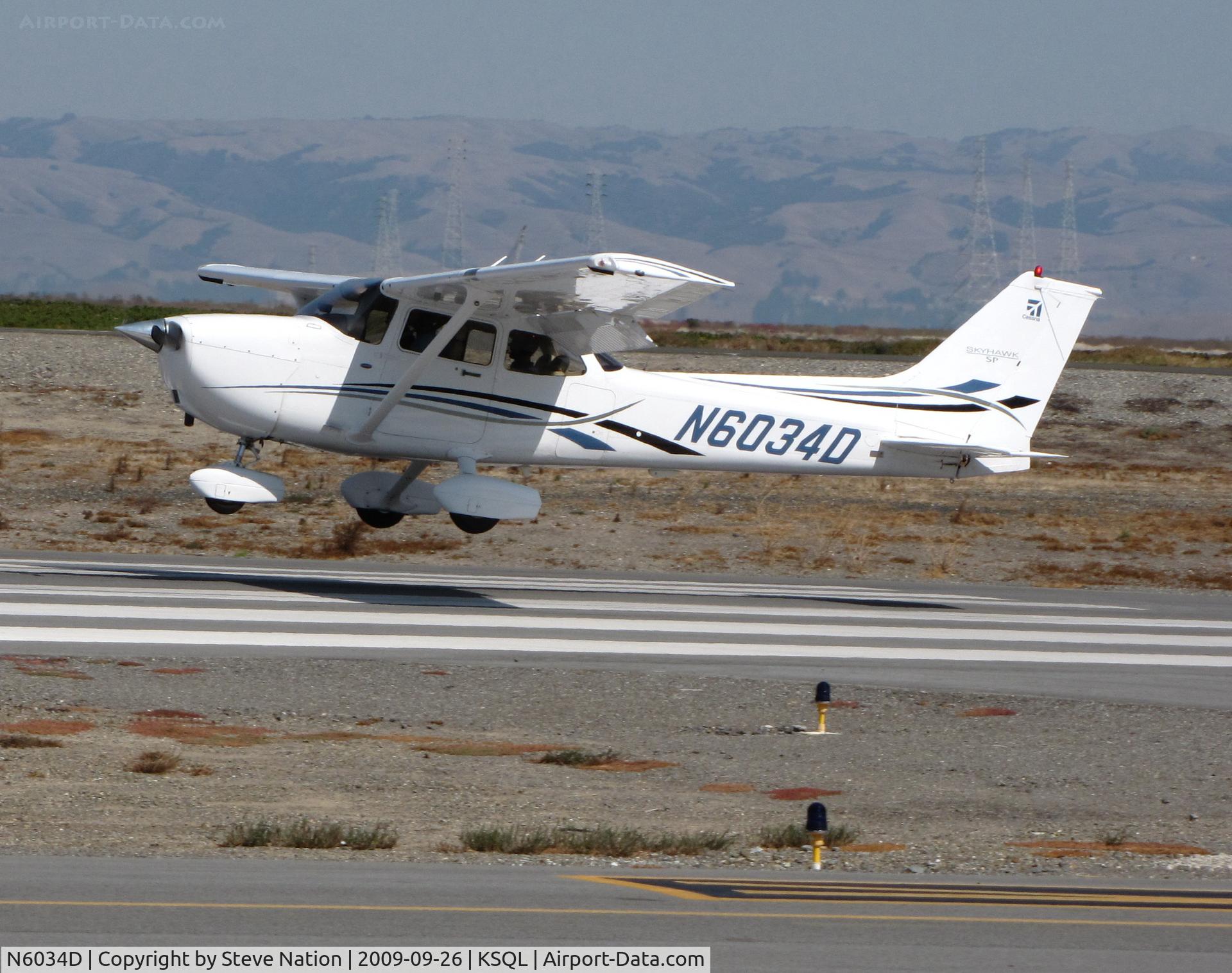N6034D, 2006 Cessna 172S C/N 172S10195, Locally-based 2006 Cesna 172S landing (heard stall horn on this one)