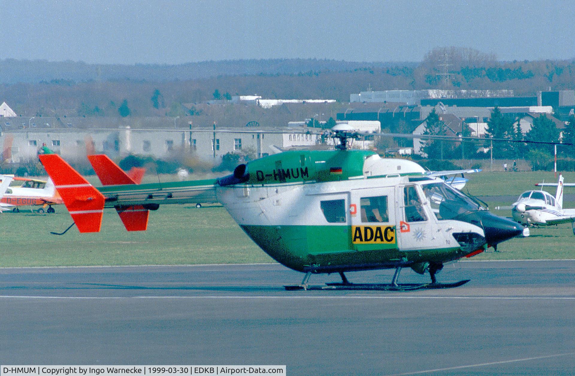 D-HMUM, 1986 MBB-Kawasaki BK-117B-2 C/N 7080, MBB-Kawasaki BK-117B-2 of ADAC Luftrettung (EMS) - ex Bavarian Police, hence the colours - at Bonn-Hangelar airfield