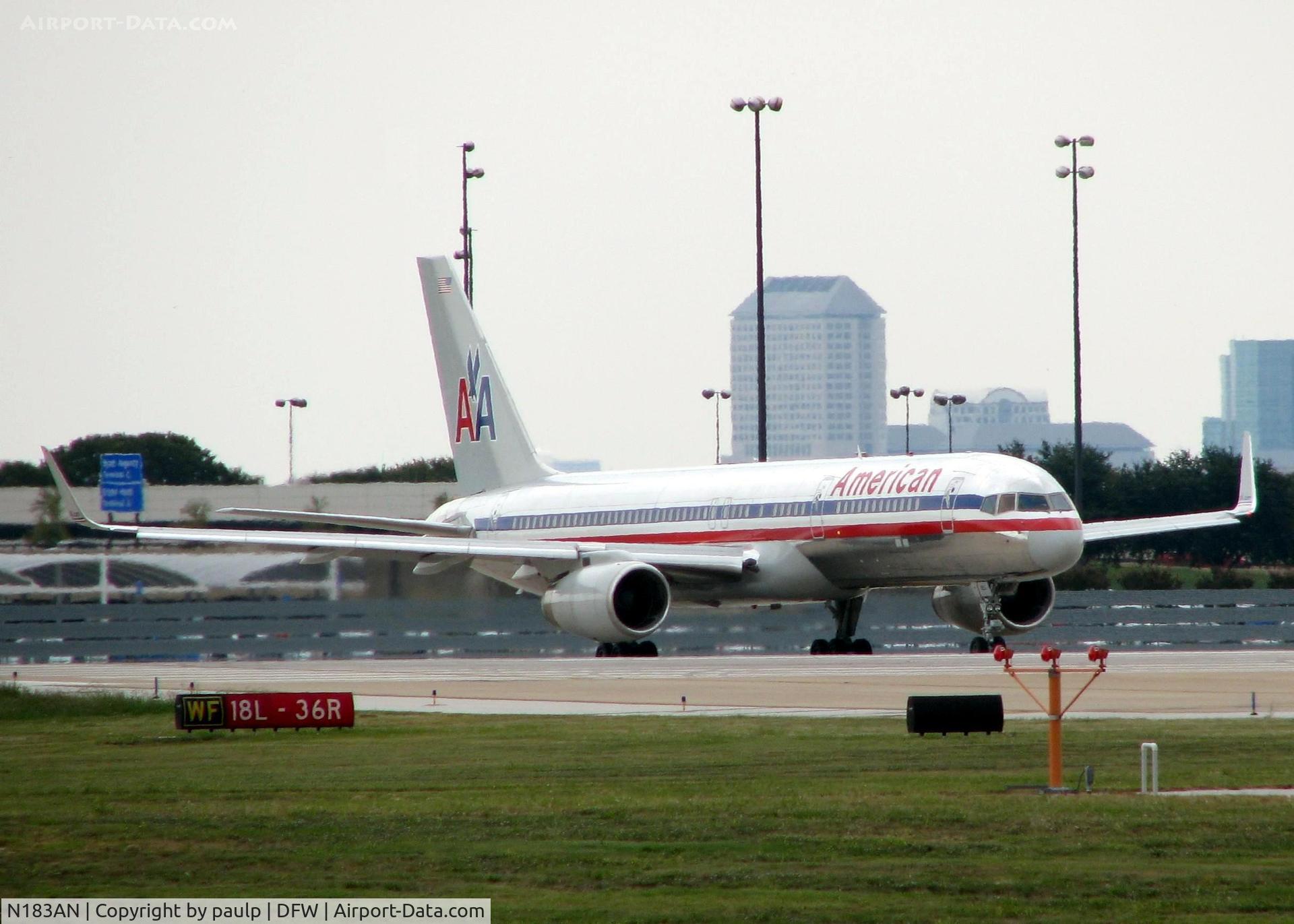 N183AN, 1999 Boeing 757-223 C/N 29593, Holding short of 18L waiting on landing traffic at DFW.