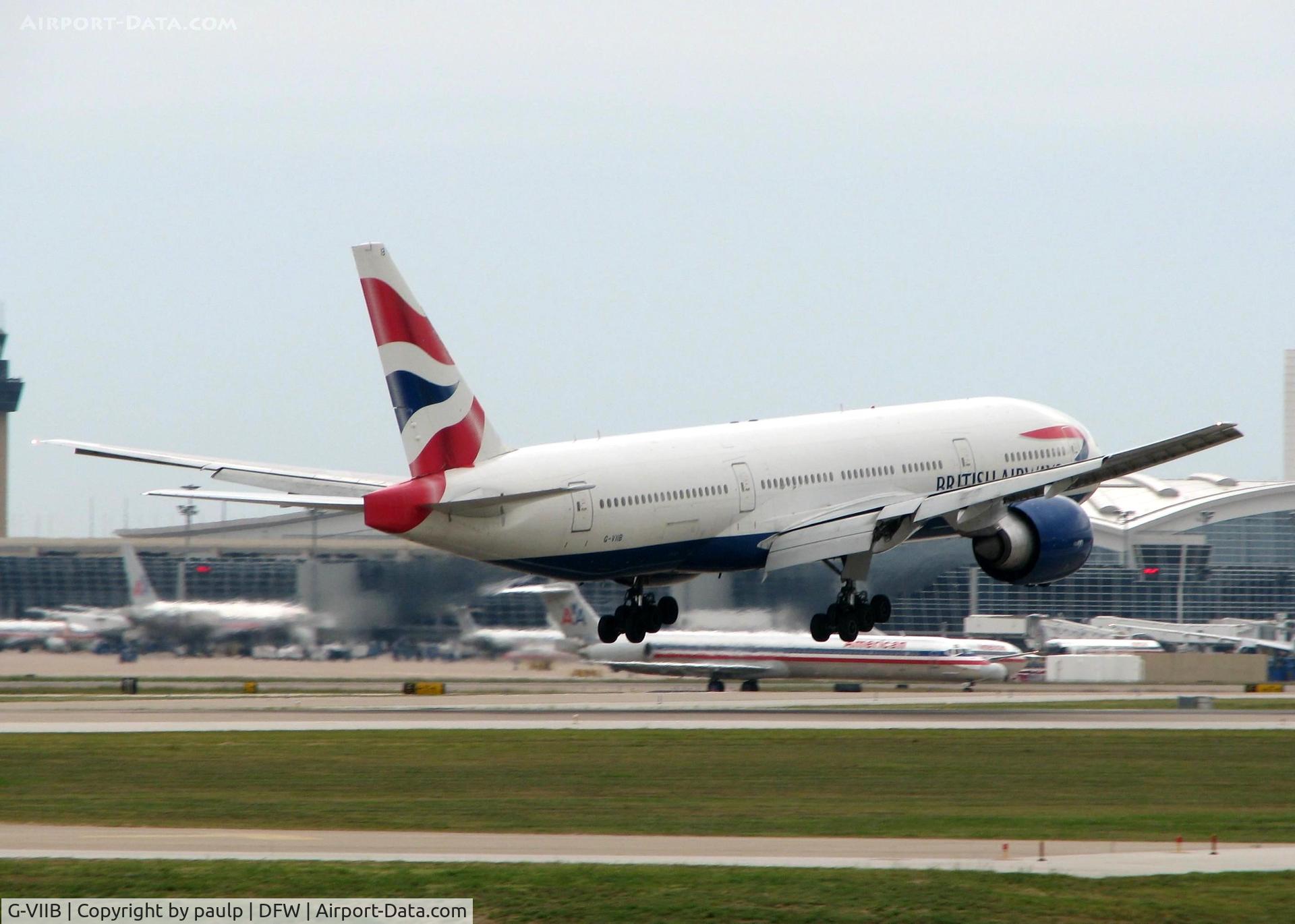 G-VIIB, 1997 Boeing 777-236 C/N 27484, BA 777 landing on 18R from London Heathrow. A rainy, overcast day in Dallas!