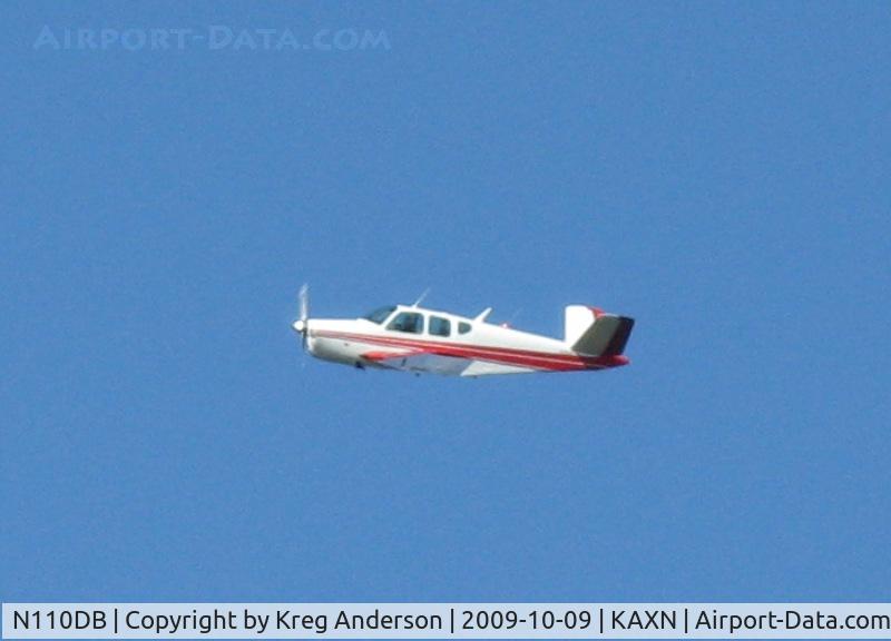 N110DB, 1956 Beech G35 Bonanza C/N D-4646, Beechcraft V35 Bonanza flying over AXN