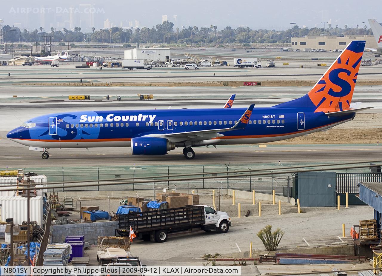 N801SY, 2001 Boeing 737-8Q8 C/N 30332, On the taxiway between rwy 25L and Imperial highway.