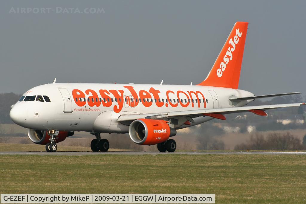 G-EZEF, 2004 Airbus A319-111 C/N 2176, Departing on Runway 26.