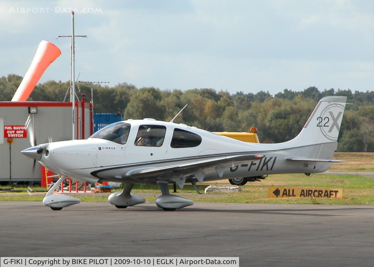 G-FIKI, 2008 Cirrus SR22 X C/N 3415, TAXYING TO SLOT THREE TO DROP OFF A COUPLE OF PAX