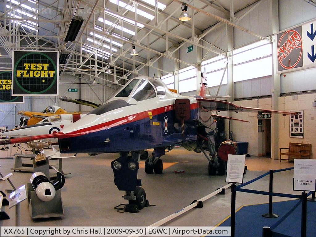 XX765, 1975 Sepecat Jaguar GR.3A C/N S.62, XX765 was withdrawn from RAF service to demonstrate the feasibility of Active Control Technology (ACT), under development by British Aerospace (BAe). The aircraft's normal control rods were replaced with a 'fly-by-wire' (FBW) control system,