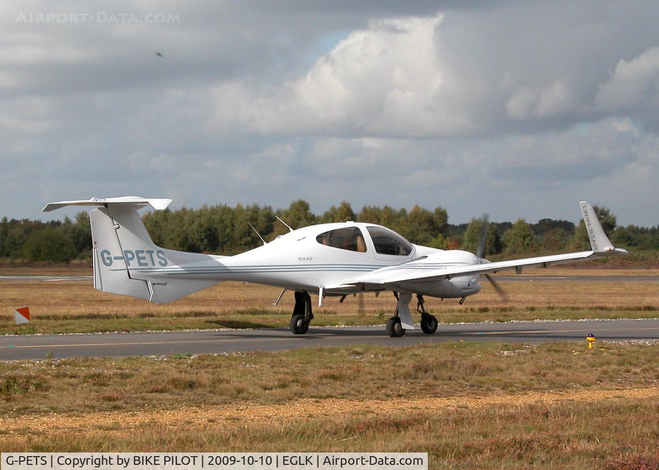 G-PETS, 2006 Diamond DA-42 Twin Star C/N 42.169, HEADING TO RWY 25 HOLD