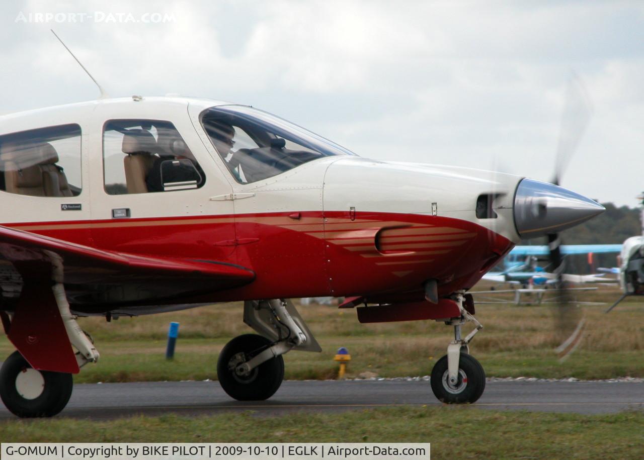 G-OMUM, 1976 Rockwell Commander 114 C/N 14067, HEADING TO RWY 25 HOLD