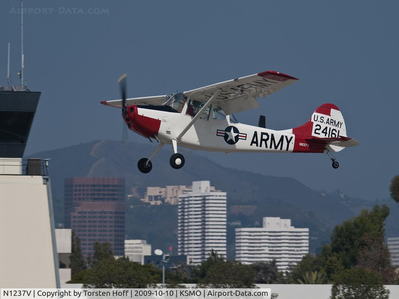 N1237V, Cessna 305F C/N AR-2, N1237V doing a touch-and-go on RWY 21