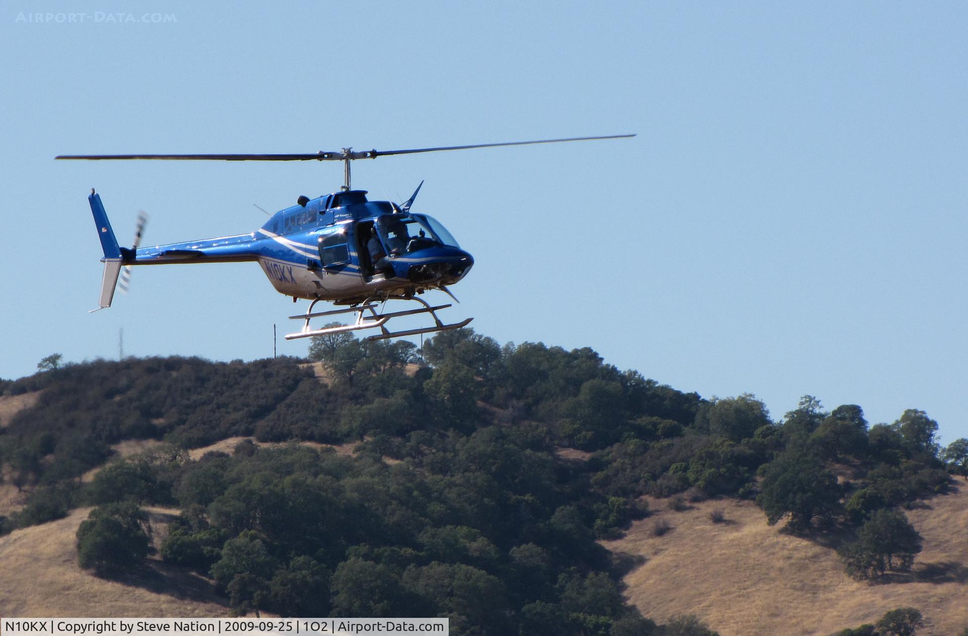N10KX, 1975 Bell 206B JetRanger II C/N 1628, 1975 Bell 206B on approach to Lampson Field (no longer dusting)
