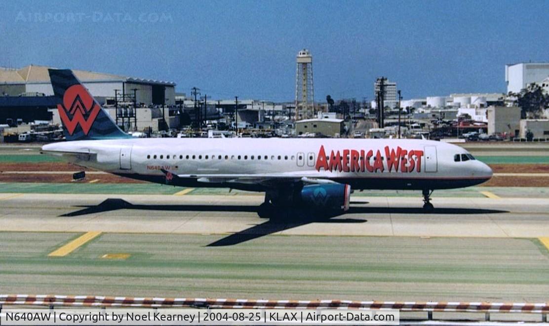 N640AW, 1994 Airbus A320-232 C/N 448, View from Tom Bradley terminal of one of the crossing taxiways