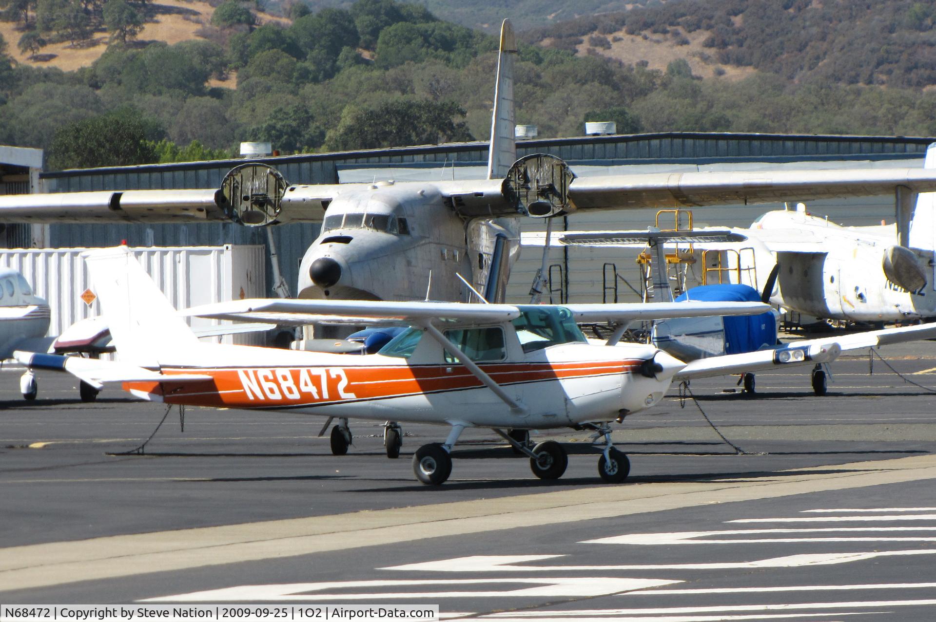 N68472, 1978 Cessna 152 C/N 15282308, Christiansen Aviation 1978 Cessna 152 taxiing by derelict Grumman HU-16E and TF-1 @ Lampson Field