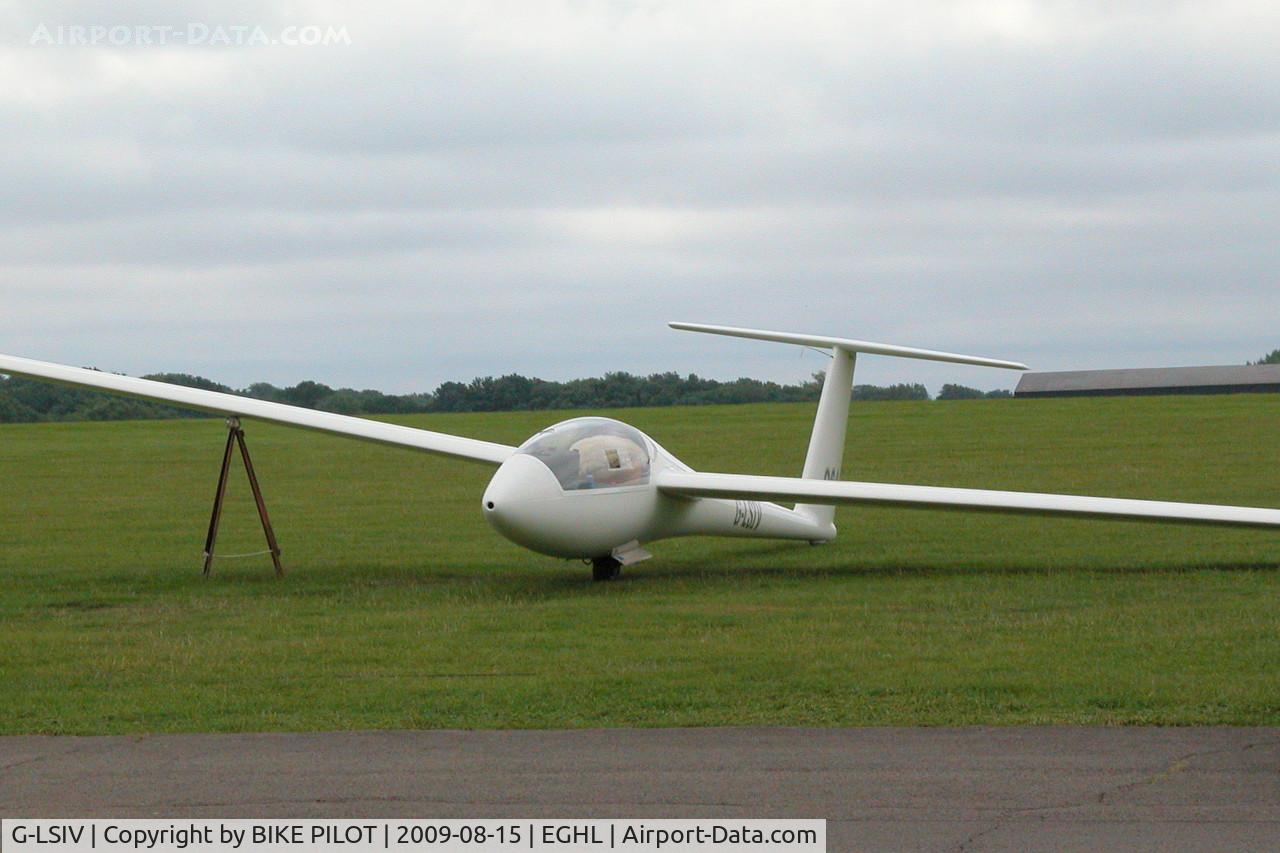 G-LSIV, 1981 Rolladen-Schneider LS-4 C/N 4189, SITTING IN FRONT OF THE CLUB HOUSE