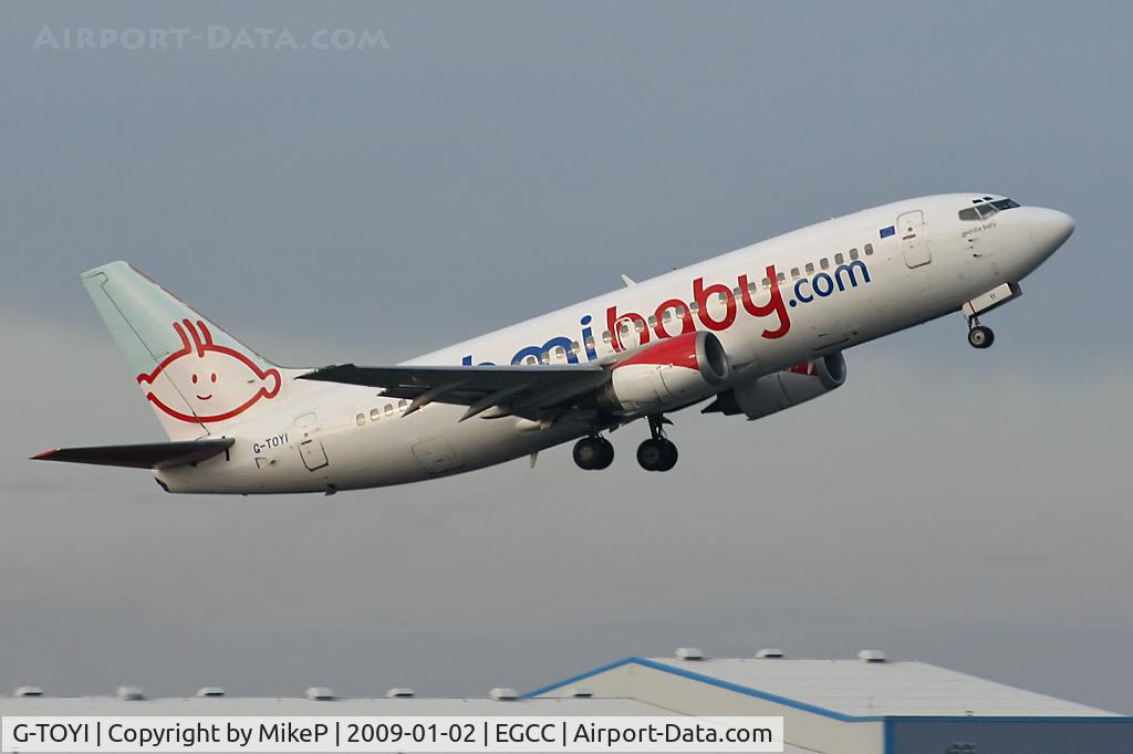 G-TOYI, 1998 Boeing 737-3Q8 C/N 28054, Climbing away from Runway 05L.