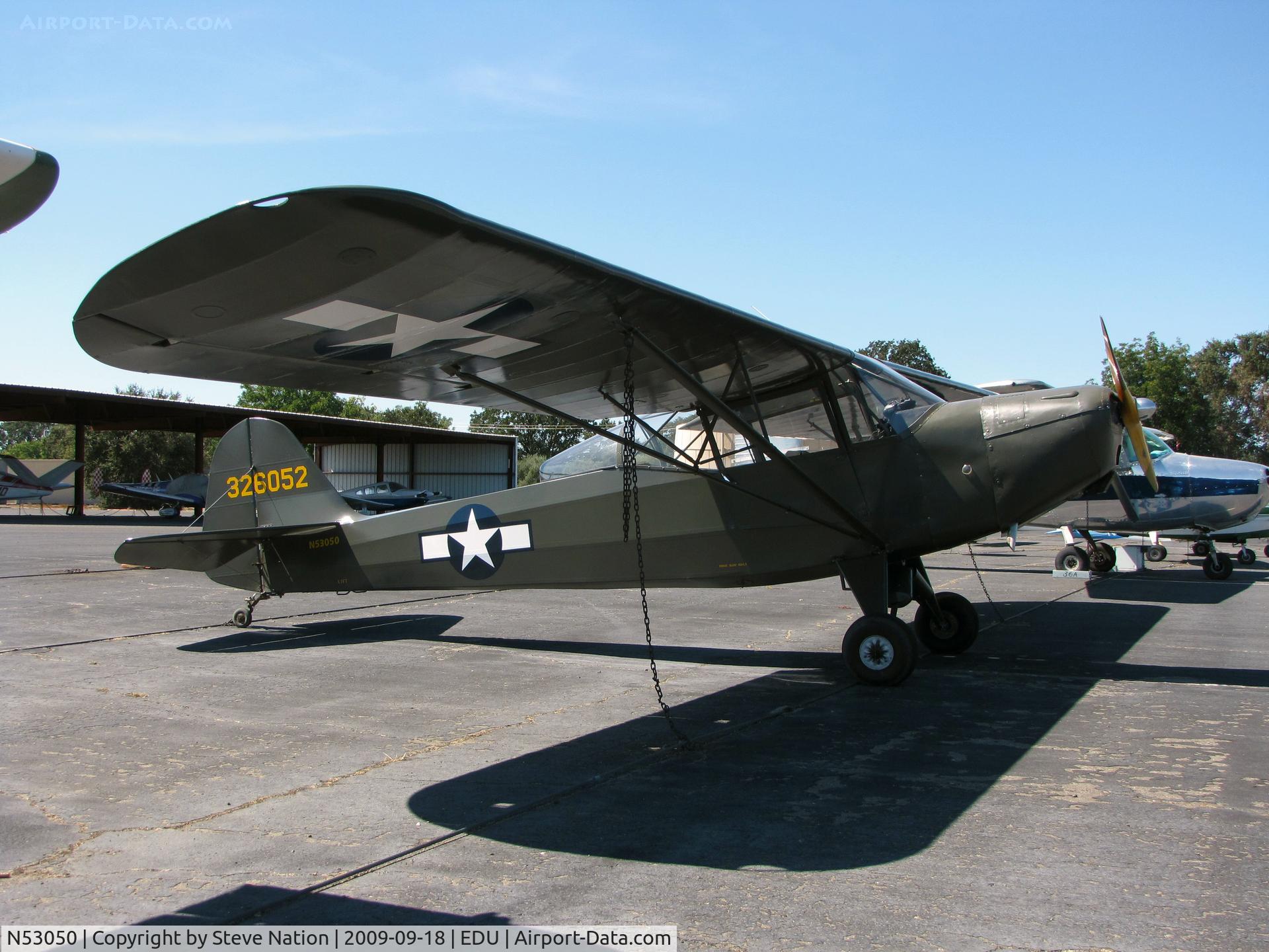 N53050, 1945 Taylorcraft L-2M C/N 6211, Beautiful 1945 Taylorcraft L-2M from Yuba City, CA masquerading as US Army 43-26052 at UC Davis (check out extended rear cockpit glass)