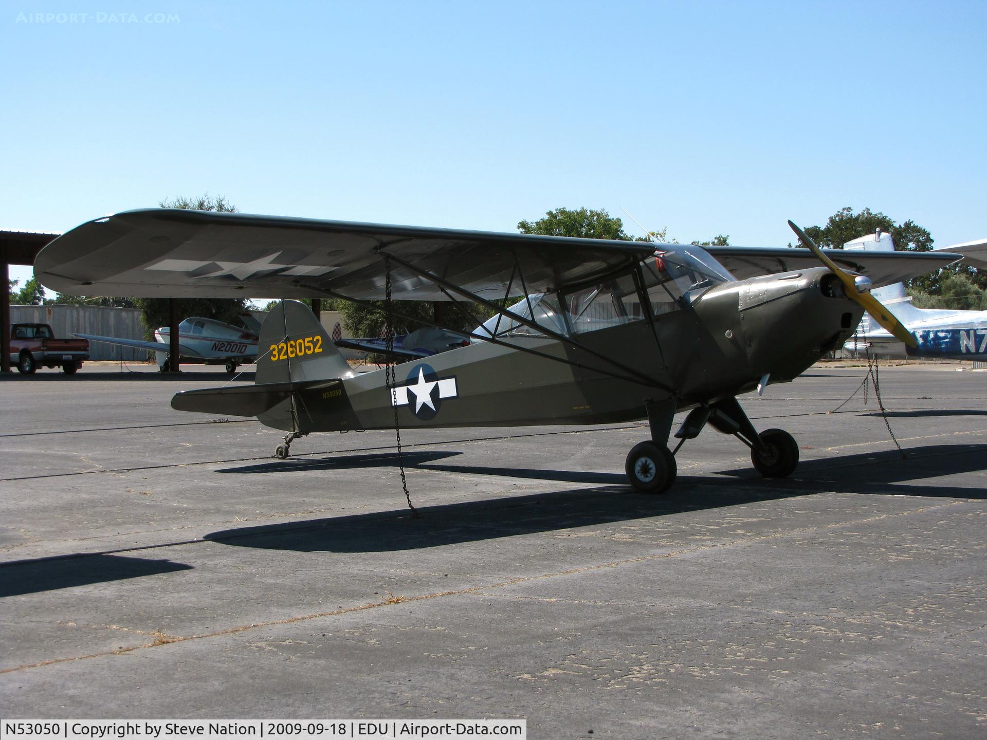 N53050, 1945 Taylorcraft L-2M C/N 6211, Beautiful 1945 Taylorcraft L-2M from Yuba City, CA masquerading as US Army 43-26052 at UC Davis (check out extended rear cockpit glass)