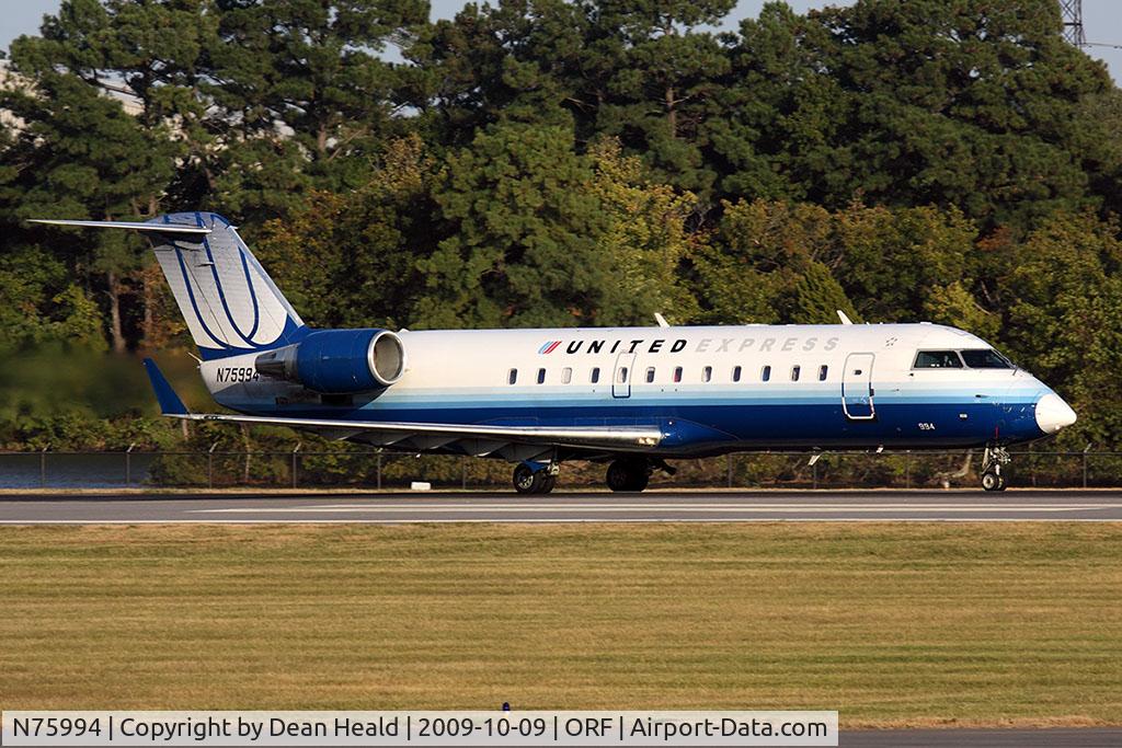 N75994, 2000 Bombardier CRJ-200ER (CL-600-2B19) C/N 7367, United Express (Mesa Airlines) N75994 (FLT ASH7011) on takeoff roll on RWY 23 enroute to Chicago O'Hare Int'l (KORD).