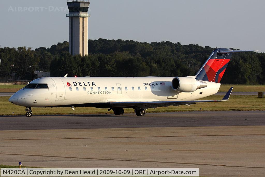 N420CA, 2000 Bombardier CRJ-100ER (CL-600-2B19) C/N 7451, Delta Connection (Comair) N420CA (FLT COM561) taxiing to RWY 23 for departure to John F Kennedy Int'l (KJFK).