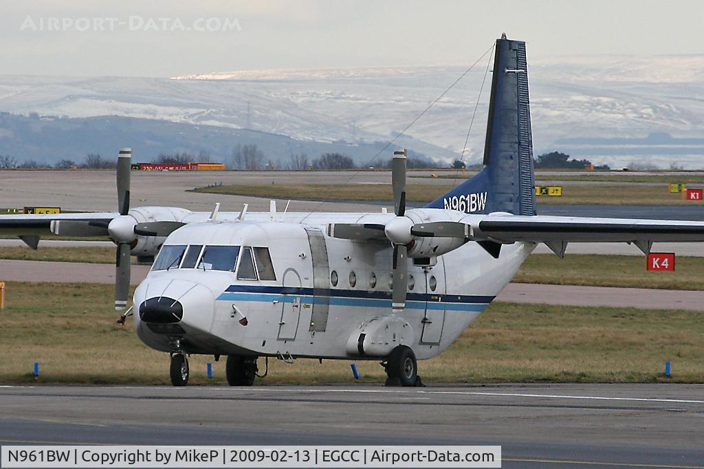 N961BW, 1982 CASA C-212-CC C/N 248, Passing thru Manchester - winter scene behind.